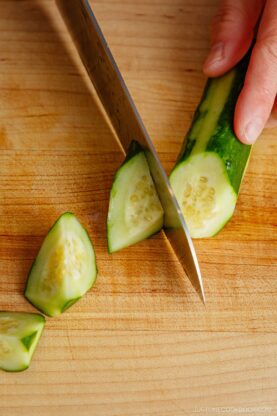 Cutting cucumber in rangiri Japanese cutting technique.