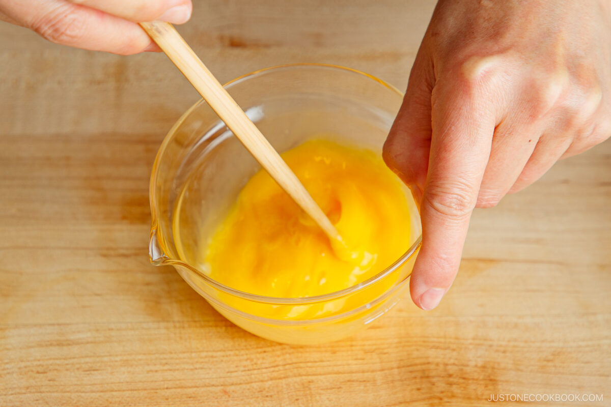 Beat the egg.