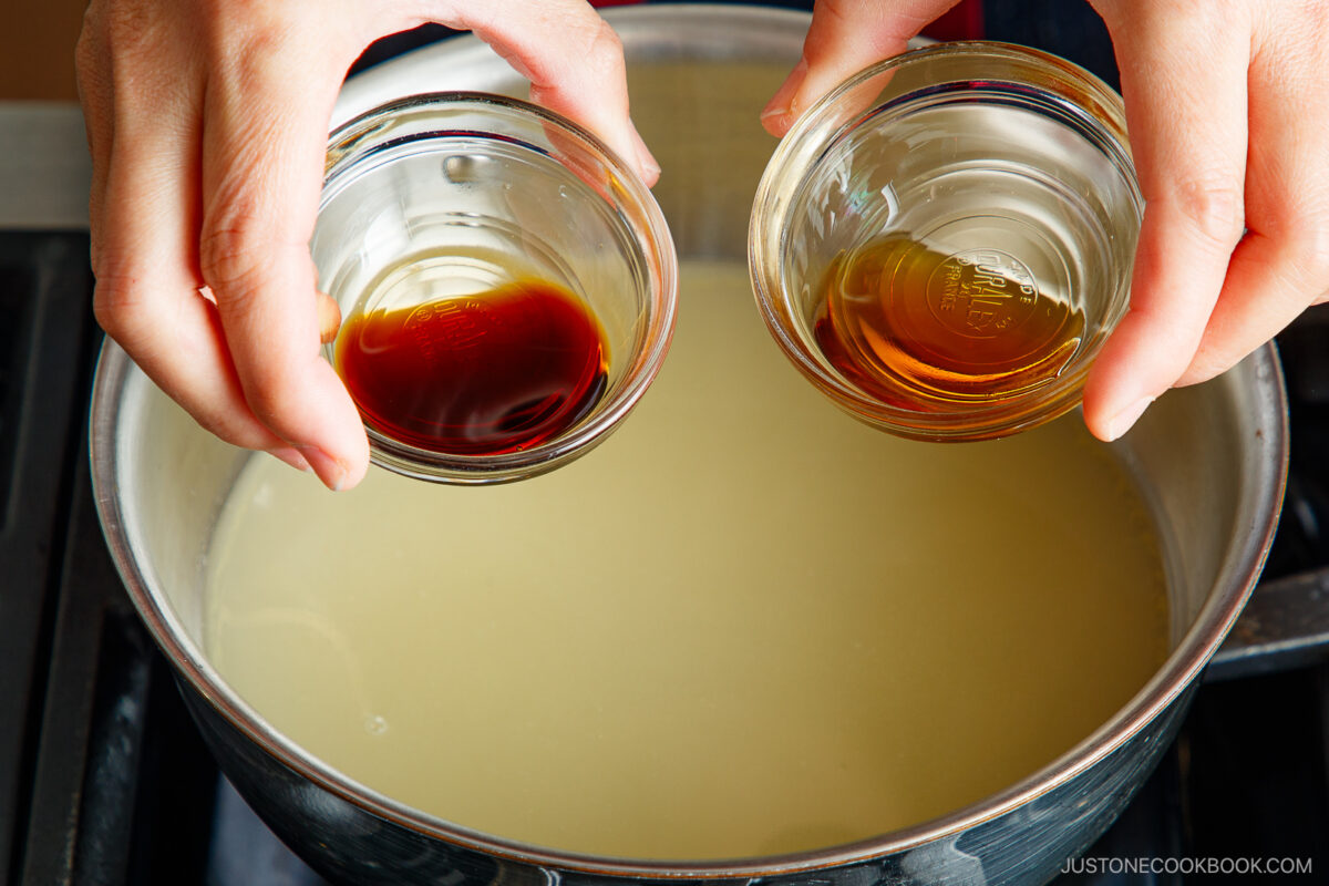 Add the soy sauce and sesame oil into the chicken stock.