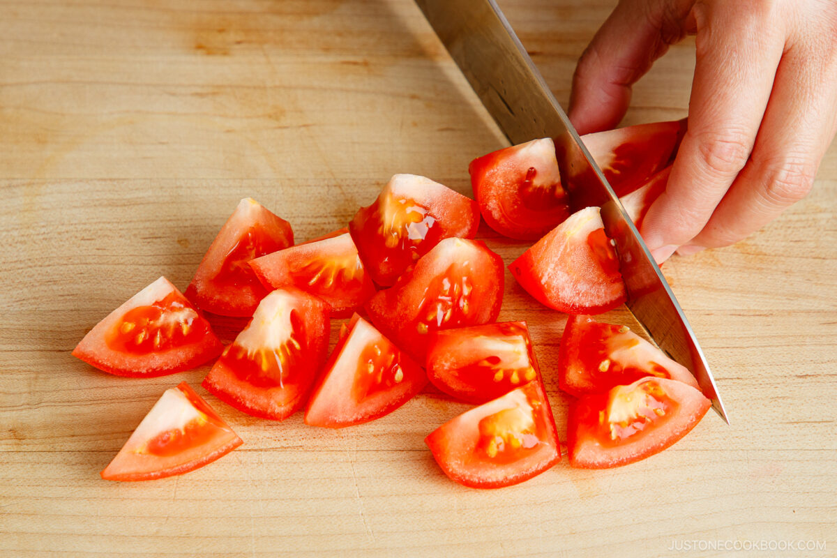 Cut the tomatoes into small pieces