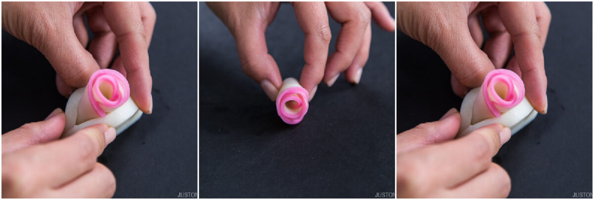 Three side-by-side photos showing hands crafting a pink and white rose-shaped decoration by carefully rolling thin slices of food on a dark surface.