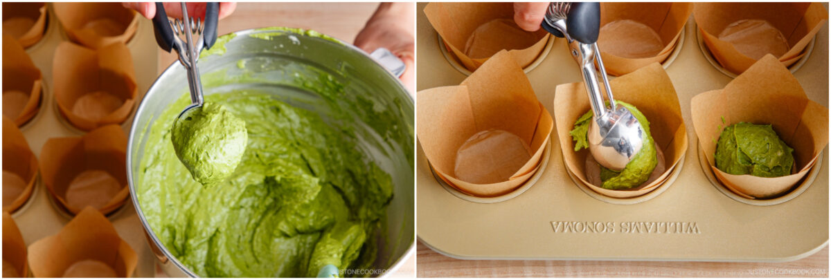 A metal scoop is used to portion green muffin batter into brown parchment paper liners in a muffin tin. The batter is in a large metal mixing bowl, and muffin liners are arranged in a baking tray.