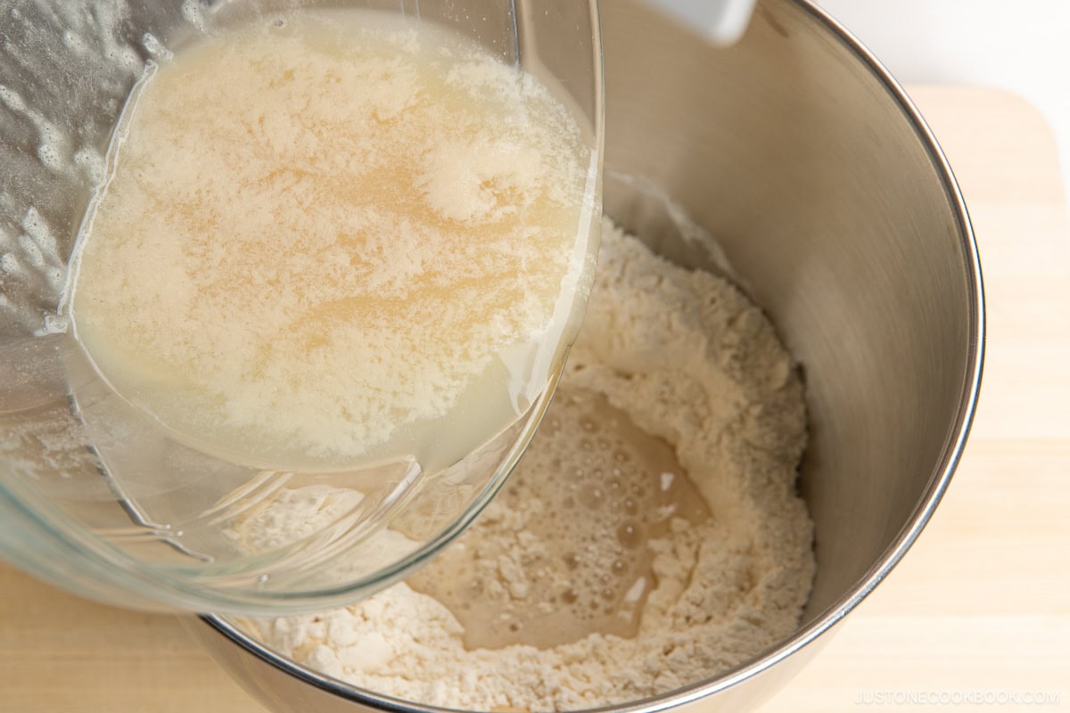 Mixing wet and dry ingredients.