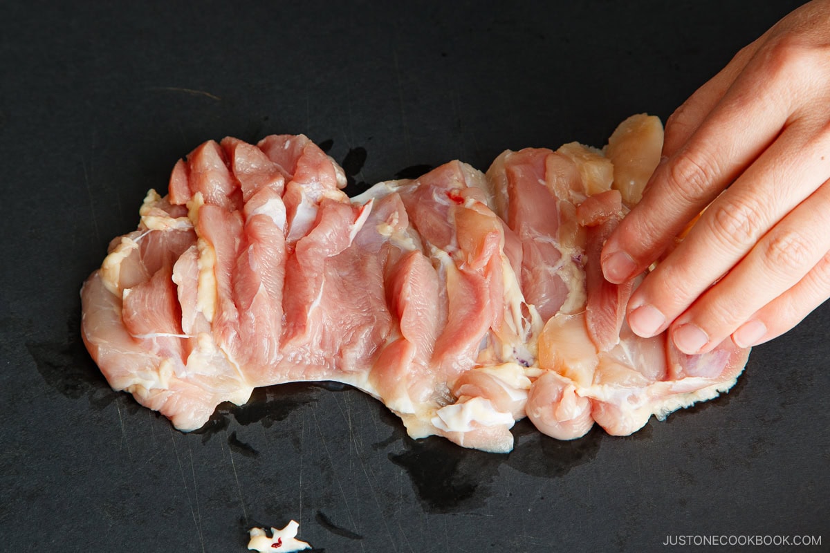 Scoring the chicken.