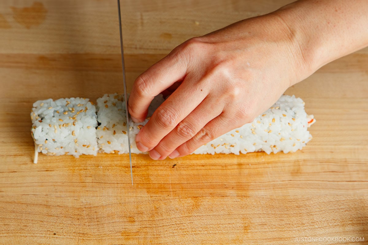 Cut the California Roll with a sharp knife.
