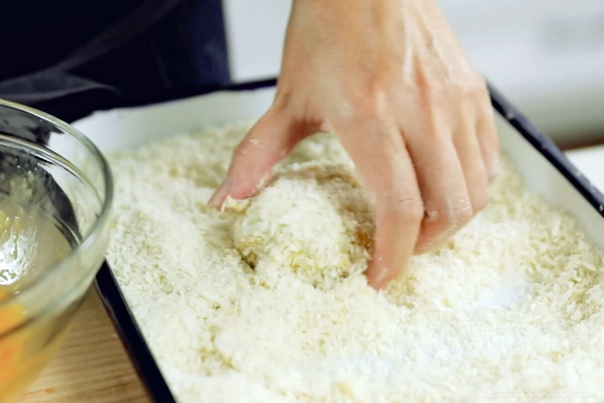 Dredge the patty in panko breadcrumbs.