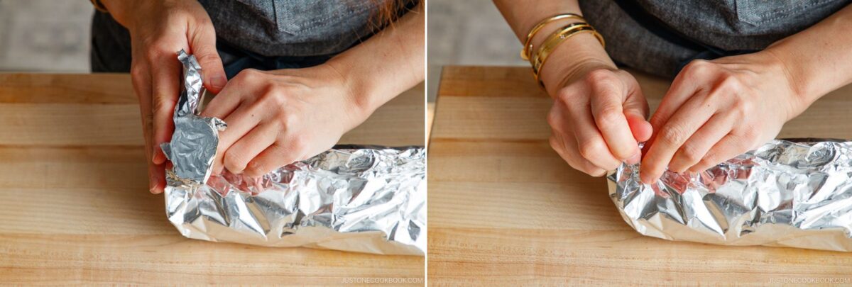 Two close-up images show hands wrapping and sealing miso salmon in foil on a wooden surface. The person, wearing a gray shirt and gold bracelets, carefully folds the aluminum to secure the fish inside.