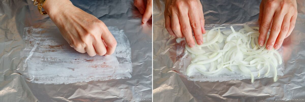Two side-by-side images: the left shows a hand spreading a white substance, likely butter, on a sheet of aluminum foil; the right displays sliced onions arranged on the buttered foil, step one for tasty miso salmon in foil.