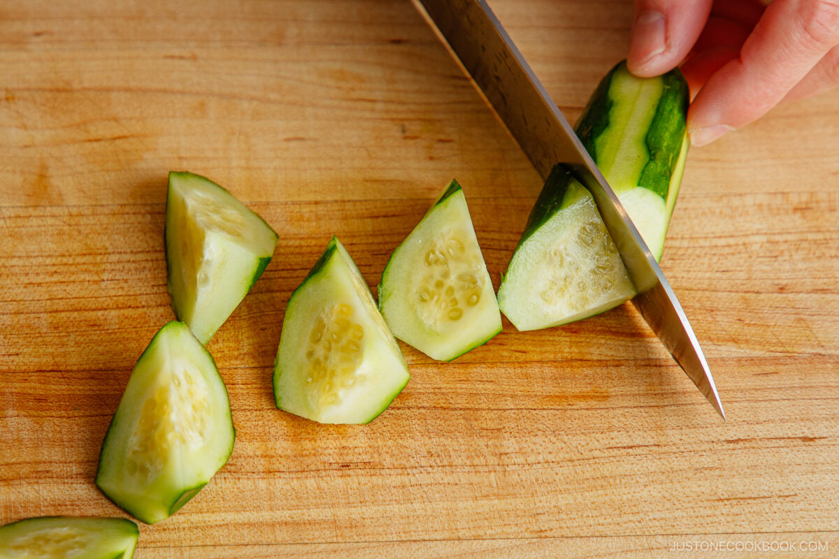 Cutting cucumber in rangiri Japanese cutting technique.