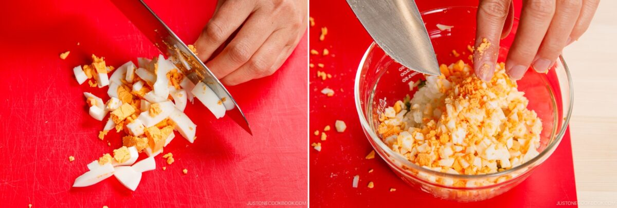 A person finely chops a hard-boiled egg on a red cutting board, then transfers the chopped egg into a glass bowl using a knife, preparing it as an ingredient for chicken nanban.